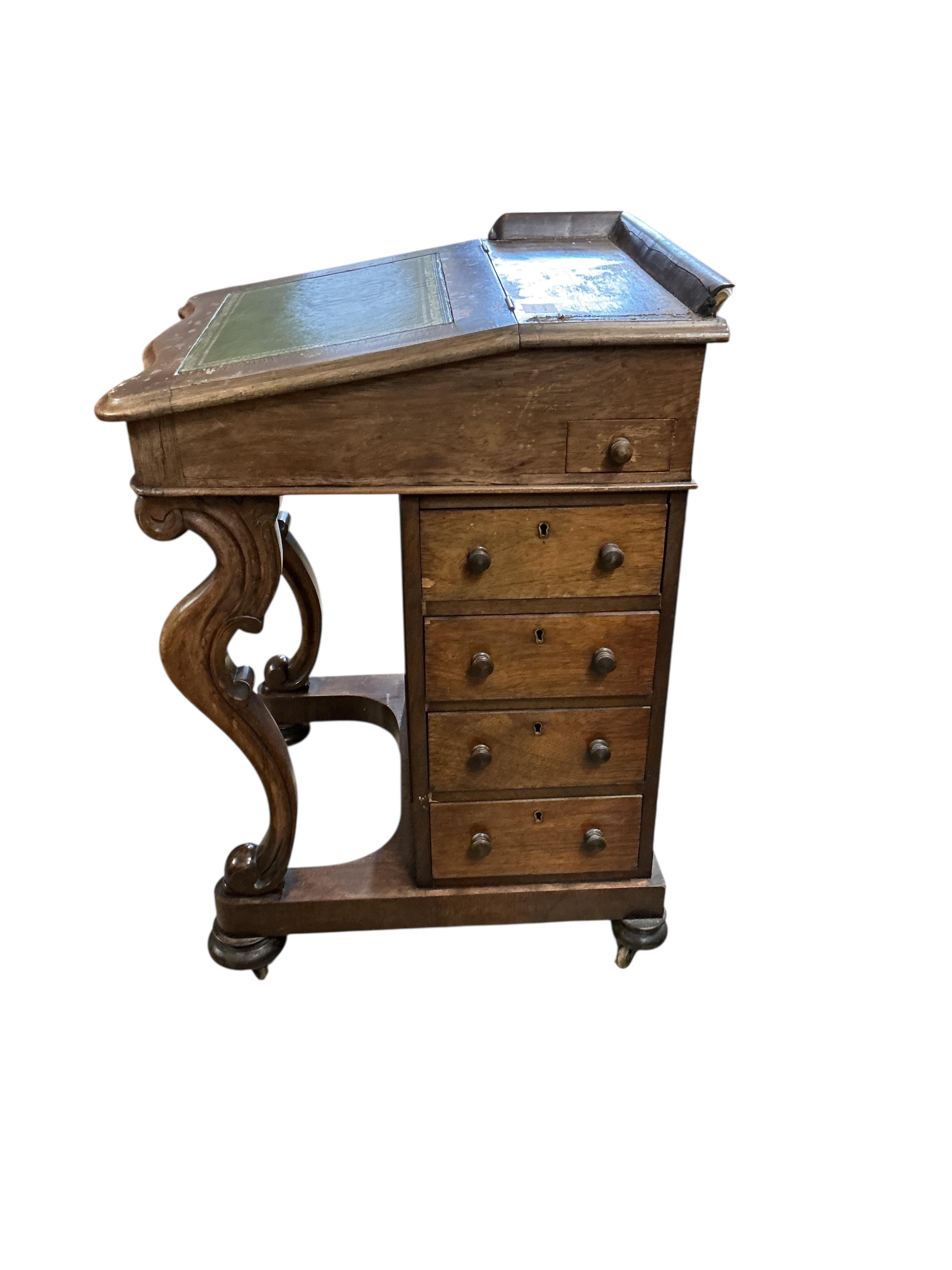 A Victorian rosewood davenport, width 54cm, depth 60cm, height 83cm